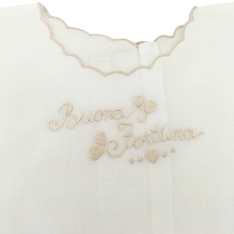 Hand-embroidered sleeveless fortune...