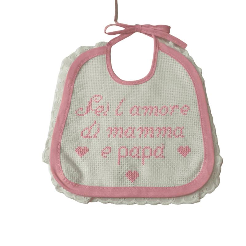 White cross-stitched baby bib with pink embroidery and lace - 