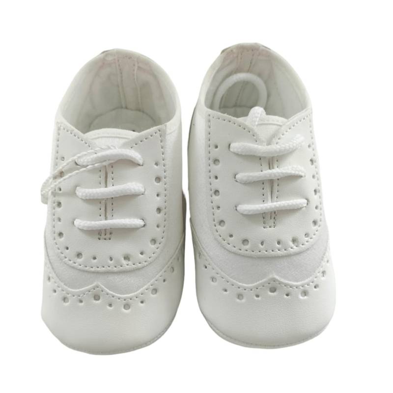 Elegant light cream-coloured baby shoes -